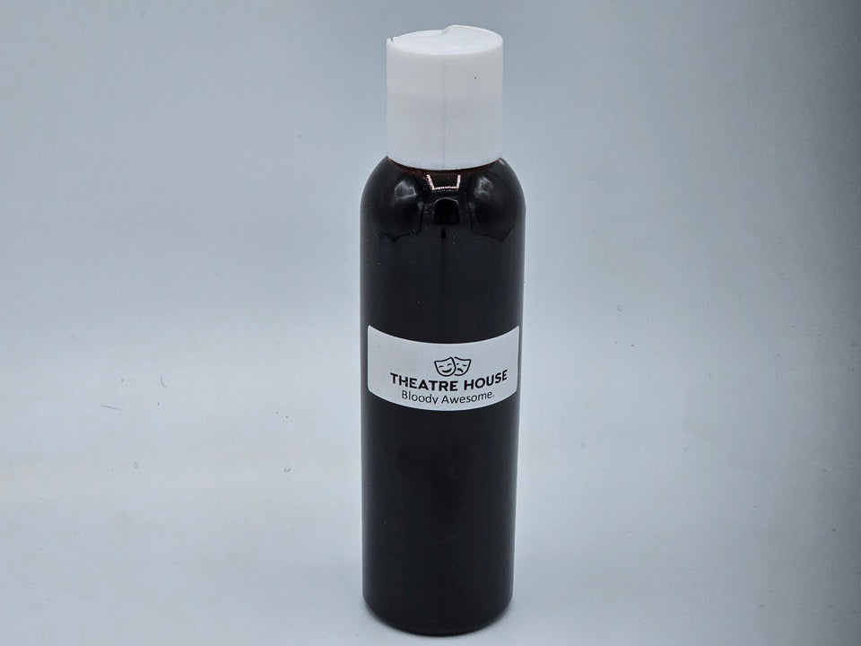 Stage Blood in-use application — realistic red blood effect on skin