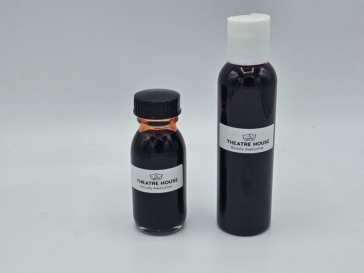 Stage Blood bottles — 2oz glass and 4oz plastic side-by-side size comparison