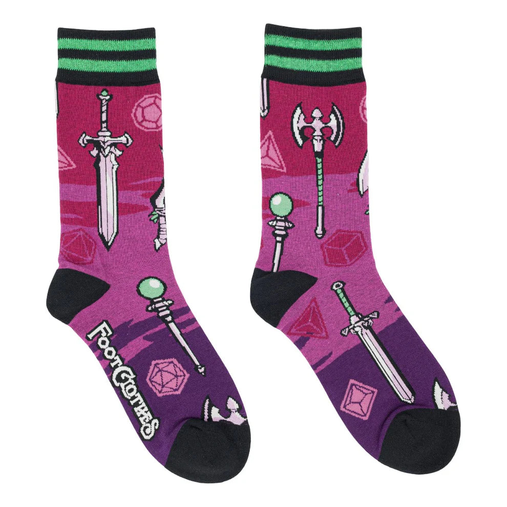 Purple socks with sword and shield designs on a white background