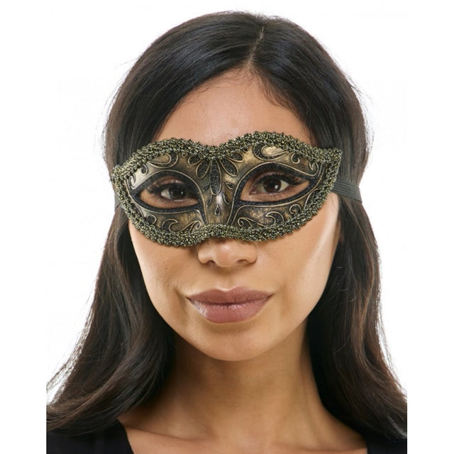 Woman wearing a decorative mask on a white background
